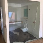 PORTA CORREDISSA ZONA DE SERVEIS RENTADORA I SECADORA A XALET D'ANDORRA FET AMB VIDRE LAMINAT 5+5+1 I FERRATGES D'ACER INOXIDABLE